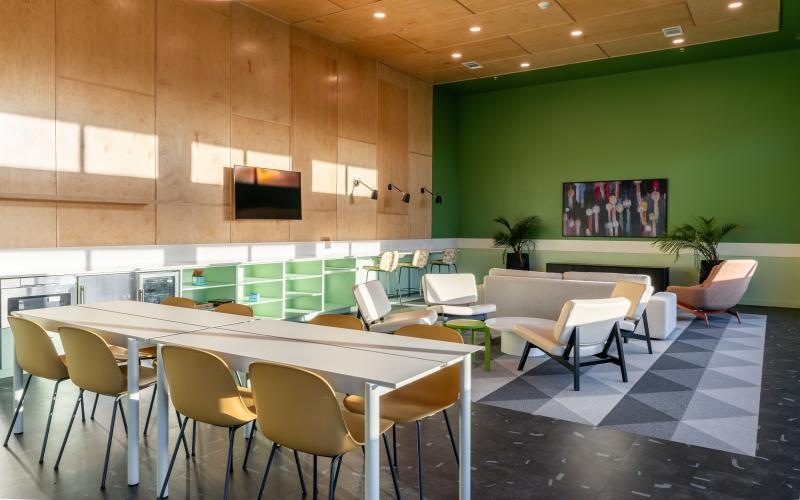 a room with a table and chairs