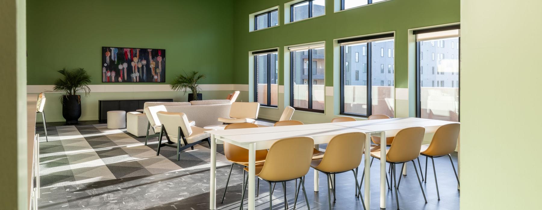 a room with tables and chairs